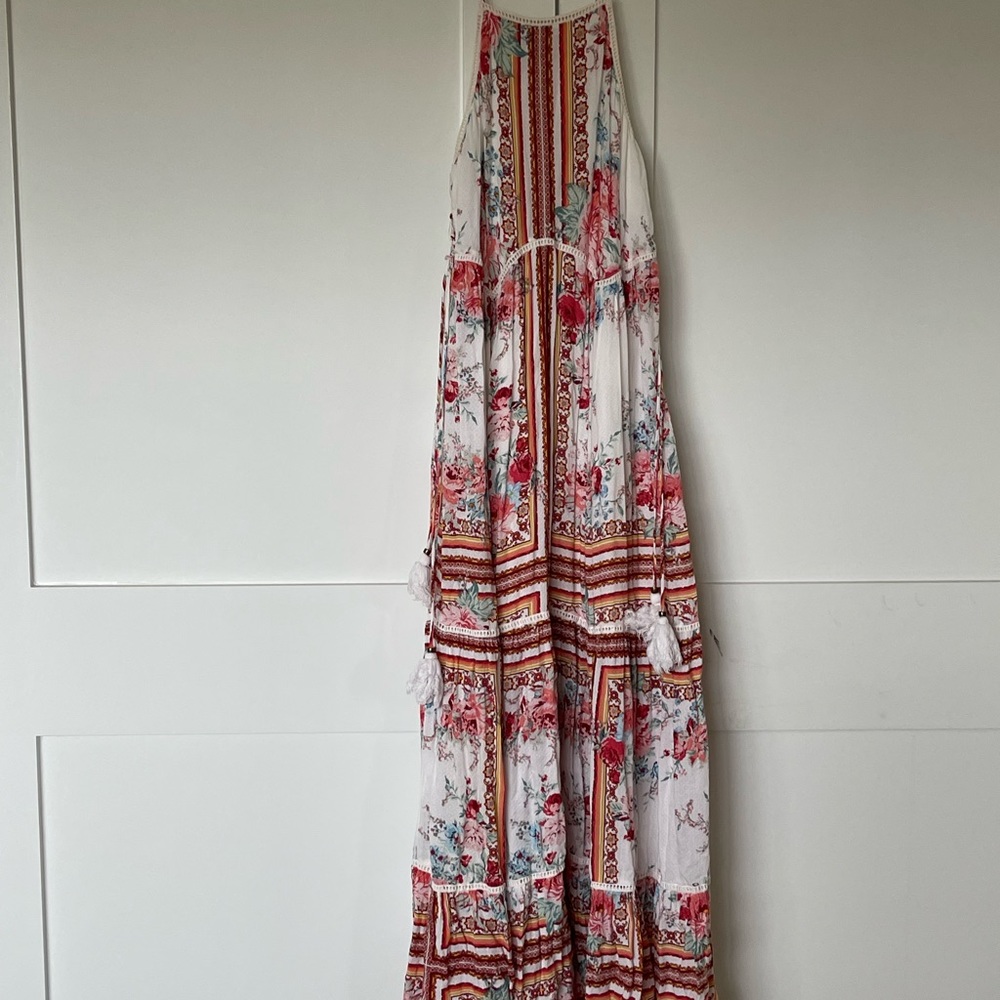 Beautiful flowy bohemian style long dress size small.  Sides tie halter type fit